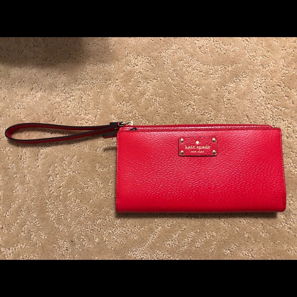 NWT - Red Kate Spade Wallet. Holds smartphone.